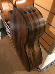 Photograph of the back and sides of a Taylor 114ce acoustic guitar